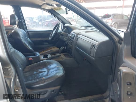 ✅ 2001 Jeep Grand Cherokee Laredo • VIN: 1J4GX48S21C648442 • Lot: 42023940. Listed on IAAI with 202,630 mi. Free auction sales archive from the USA and detailed vehicle history report at DreamBid. Image 5.