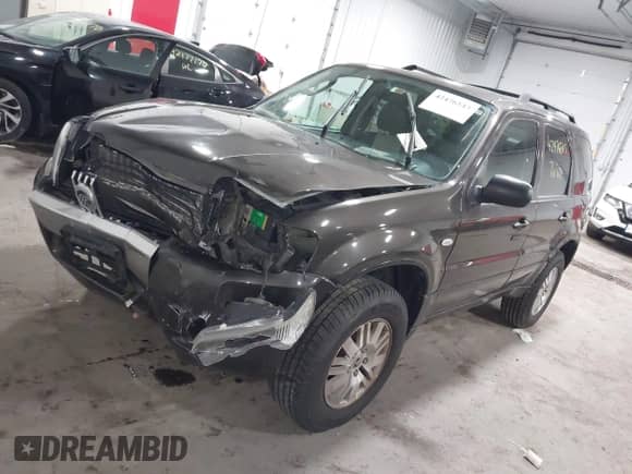 2006 Mercury Mariner Luxury z VIN 4M2CU56126KJ03006, wystawiony jako IAAI lot #42476543 z przebiegiem 114 288 mil mil oraz . Historia ofert i sprzedaży dostępna na DreamBid. Obrazek 17.