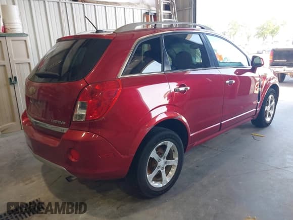 ✅ 2013 Chevrolet Captiva Sport LT • VIN: 3GNAL3EK7DS590632 • Лот: 42527871. Опубликован ранее на IAAI с пробегом 126 711 миль. Бесплатный доступ к архиву аукционных продаж из США и подробный отчёт об истории автомобиля на DreamBid. Изображение 4.