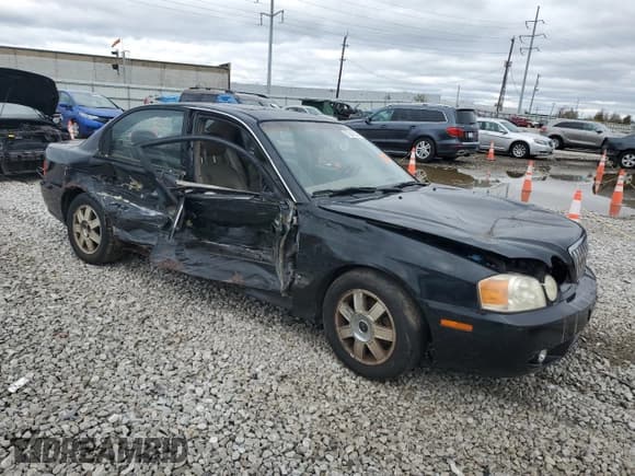 ✅ 2003 Kia Optima LX • VIN: KNAGD128035201333 • Лот: 78242864. Опубликован ранее на Copart с пробегом 168 119 миль. Бесплатный доступ к архиву аукционных продаж из США и подробный отчёт об истории автомобиля на DreamBid. Изображение 4.