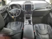 ✅ 2022 Ford Edge Titanium • VIN: 2FMPK4K97NBA39830 • Lot: 94776445. Wystawiony na Copart z przebiegiem 110 783 mil. Bezpłatny archiwum sprzedaży aukcyjnych z USA i szczegółowy raport historii pojazdu na DreamBid. Zdjęcie 8.