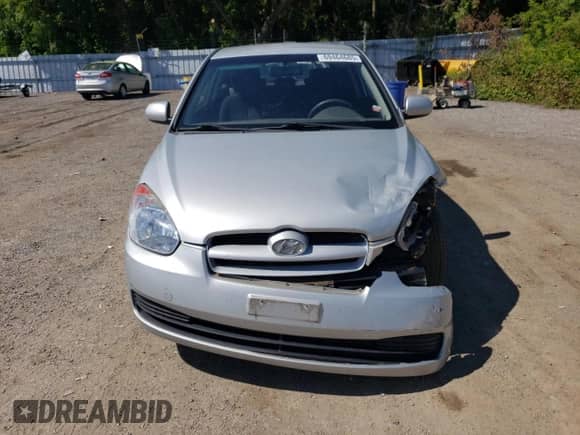 2010 Hyundai Accent L with VIN KMHCN3BCXAU182917, listed as a Copart auction lot 69464685 with 124,678 mi miles and Salvage title. Bid and sale history available at DreamBid. Image 5.