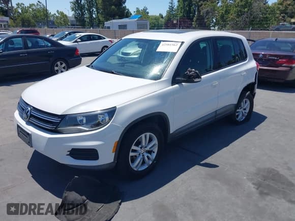 ✅ 2012 Volkswagen Tiguan SE • VIN: WVGAV7AX4CW603198 • Lot: 42581562. Listed on IAAI with 119,739 mi. Free auction sales archive from the USA and detailed vehicle history report at DreamBid. Image 2.