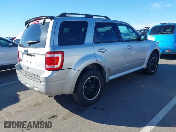✅ 2011 Ford Escape XLT • VIN: 1FMCU0D71BKA42950 • Lot: 43787150. Listed on IAAI with 257,927 mi. Free auction sales archive from the USA and detailed vehicle history report at DreamBid. Image 4.