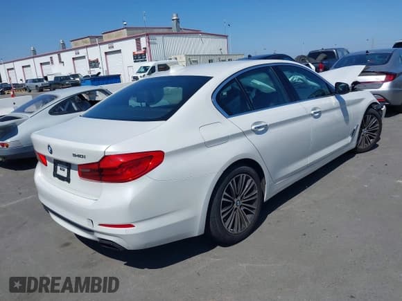✅ 2018 BMW 5 Series 540i • VIN: WBAJE5C53JWA98577 • Lot: 42206800. Listed on IAAI with 65,003 mi. Free auction sales archive from the USA and detailed vehicle history report at DreamBid. Image 4.
