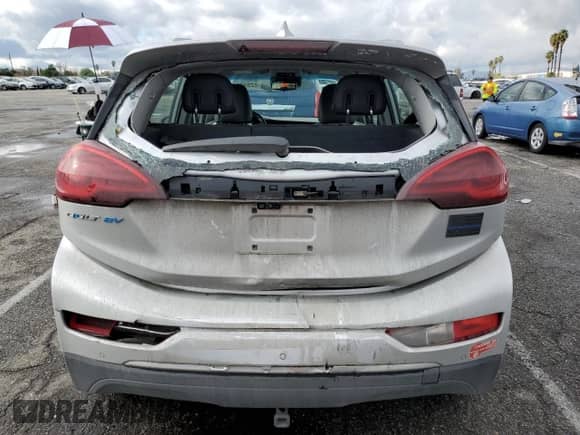 2018 Chevrolet Bolt EV Premier with VIN 1G1FX6S01J4134041, listed as a Copart auction lot 82892843 with 79,703 mi miles and . Bid and sale history available at DreamBid. Image 6.