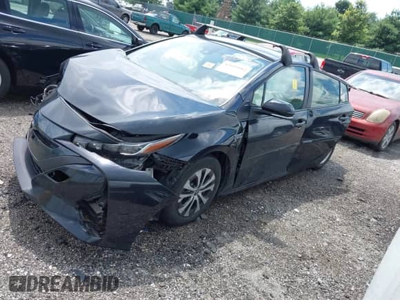 2022 Toyota Prius Limited z VIN JTDKAMFPXN3227770, wystawiony jako IAAI lot #42695882 z przebiegiem 42 373 mil mil oraz . Historia ofert i sprzedaży dostępna na DreamBid. Obrazek 2.