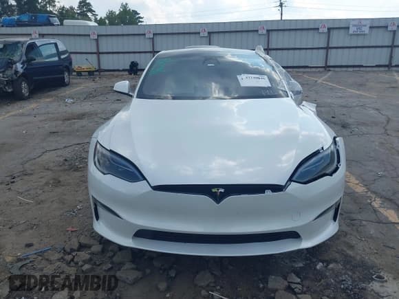 ✅ 2023 Tesla Model S Plaid • VIN: 5YJSA1E63PF521945 • Lot: 43248046. Listed on IAAI with 26,327 mi. Free auction sales archive from the USA and detailed vehicle history report at DreamBid. Image 13.