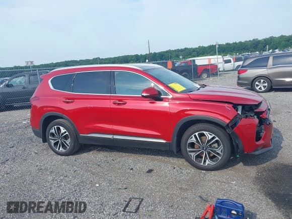 ✅ 2020 Hyundai Santa Fe Limited • VIN: 5NMS5CAA3LH153169 • Лот: 42607637. Опубликован ранее на IAAI с пробегом 94 402 миль. Бесплатный доступ к архиву аукционных продаж из США и подробный отчёт об истории автомобиля на DreamBid. Изображение 13.