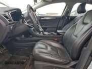 ✅ 2015 Ford Fusion Titanium Hybrid • VIN: 3FA6P0RU6FR179817 • Lot: 95251945. Wystawiony na Copart z przebiegiem 115 636 mil. Bezpłatny archiwum sprzedaży aukcyjnych z USA i szczegółowy raport historii pojazdu na DreamBid. Zdjęcie 7.