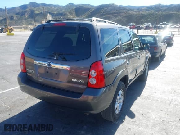 ✅ 2006 Mazda Tribute S • VIN: 4F2CZ04156KM21652 • Лот: 43826559. Опубликован ранее на IAAI с пробегом 221 384 миль. Бесплатный доступ к архиву аукционных продаж из США и подробный отчёт об истории автомобиля на DreamBid. Изображение 4.