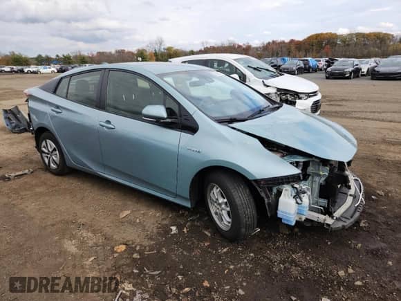 2018 Toyota Prius Two z VIN JTDKBRFU7J3058785, wystawiony jako Copart lot #90085795 z przebiegiem 83 292 mil mil oraz Szkoda całkowita • Salvage title. Historia ofert i sprzedaży dostępna na DreamBid. Obrazek 4.