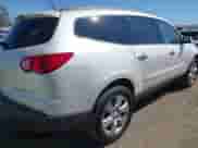 2012 Chevrolet Traverse LTZ z VIN 1GNKRLED2CJ184102, wystawiony jako IAAI lot #43306369 z przebiegiem 156 274 mil mil oraz . Historia ofert i sprzedaży dostępna na DreamBid. Obrazek 4.