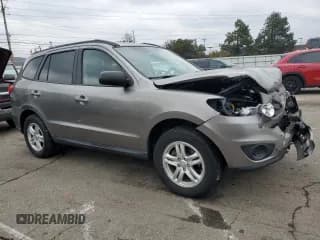 ✅ 2011 Hyundai Santa Fe GLS • VIN: 5XYZGDAG2BG019619 • Lot: 86691604. Listed on Copart with 125,338 mi. Free auction sales archive from the USA and detailed vehicle history report at DreamBid. Image 4.