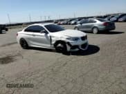 ✅ 2016 BMW 2 Series M235i xDrive • VIN: WBA1J9C54GV696384 • Lot: 69851635. Wystawiony na Copart z przebiegiem 66 910 mil. Bezpłatny archiwum sprzedaży aukcyjnych z USA i szczegółowy raport historii pojazdu na DreamBid. Zdjęcie 13.