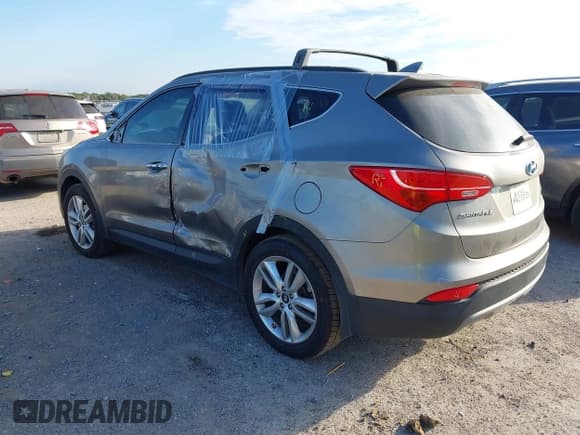 ✅ 2016 Hyundai Santa Fe • VIN: 5XYZW4LA8GG309060 • Лот: 43413819. Опубликован ранее на IAAI с пробегом 122 315 миль. Бесплатный доступ к архиву аукционных продаж из США и подробный отчёт об истории автомобиля на DreamBid. Изображение 3.