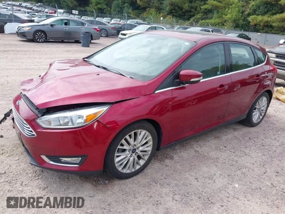 ✅ 2017 Ford Focus Titanium • VIN: 1FADP3N22HL302561 • Lot: 43252752. Listed on IAAI with 129,322 mi. Free auction sales archive from the USA and detailed vehicle history report at DreamBid. Image 2.