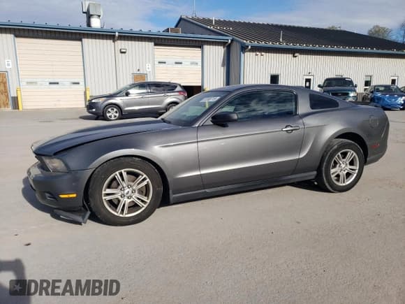 ✅ 2012 Ford Mustang V6 • VIN: 1ZVBP8AM0C5272847 • Lot: 87098715. Listed on Copart with 144,217 mi. Free auction sales archive from the USA and detailed vehicle history report at DreamBid. Image 1.