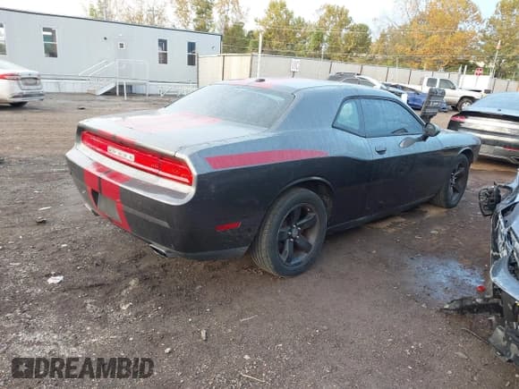 ✅ 2013 Dodge Challenger SXT • VIN: 2C3CDYAG0DH665966 • Lot: 43543054. Listed on IAAI with 128,859 mi. Free auction sales archive from the USA and detailed vehicle history report at DreamBid. Image 4.
