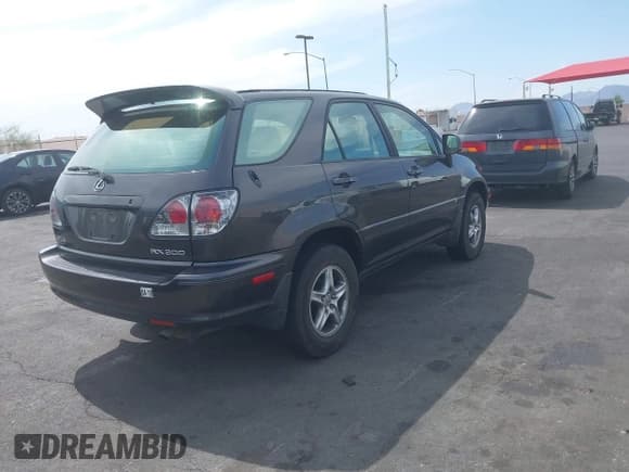 ✅ 2002 Lexus RX 300 • VIN: JTJGF10U420138288 • Lot: 42360614. Listed on IAAI with 136,583 mi. Free auction sales archive from the USA and detailed vehicle history report at DreamBid. Image 4.