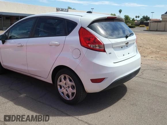 ✅ 2013 Ford Fiesta SE • VIN: 3FADP4EJ2DM109977 • Лот: 69822935. Опубликован ранее на Copart с пробегом 71 501 миль. Бесплатный доступ к архиву аукционных продаж из США и подробный отчёт об истории автомобиля на DreamBid. Изображение 3.