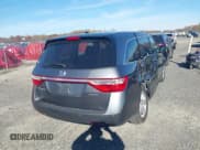 ✅ 2012 Honda Odyssey Touring • VIN: 5FNRL5H96CB103962 • Lot: 43587214. Listed on IAAI with 169,916 mi. Free auction sales archive from the USA and detailed vehicle history report at DreamBid. Image 4.
