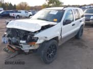 ✅ 2002 Jeep Grand Cherokee Laredo • VIN: 1J4GX48N82C186688 • Lot: 43657283. Listed on IAAI with 214,970 mi. Free auction sales archive from the USA and detailed vehicle history report at DreamBid. Image 2.