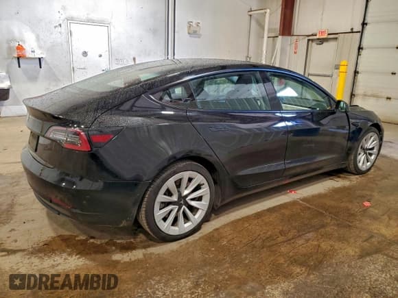 ✅ 2022 Tesla Model 3 • VIN: 5YJ3E1EA5NF370293 • Lot: 94642395. Wystawiony na Copart z przebiegiem 112 890 mil. Bezpłatny archiwum sprzedaży aukcyjnych z USA i szczegółowy raport historii pojazdu na DreamBid. Zdjęcie 3.