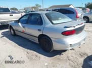 ✅ 2001 Pontiac Sunfire SE • VIN: 1G2JB524217173494 • Lot: 41276548. Wystawiony na IAAI z przebiegiem Nie podano. Bezpłatny archiwum sprzedaży aukcyjnych z USA i szczegółowy raport historii pojazdu na DreamBid. Zdjęcie 3.