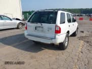 ✅ 2002 Isuzu Rodeo S • VIN: 4S2CK58W524321108 • Lot: 42352330. Listed on IAAI with 270,614 mi. Free auction sales archive from the USA and detailed vehicle history report at DreamBid. Image 4.