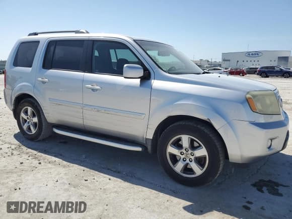 ✅ 2010 Honda Pilot EX-L • VIN: 5FNYF3H69AB008676 • Lot: 67099175. Listed on Copart with 264,277 mi. Free auction sales archive from the USA and detailed vehicle history report at DreamBid. Image 4.