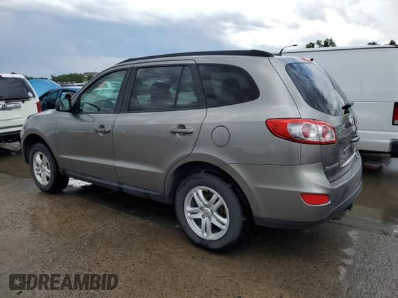 2012 Hyundai Santa Fe GLS с VIN 5XYZGDAB0CG157178, выставлен на аукционе Copart как лот 58784664 с пробегом 166 163 миль миль и Списание • Salvage title. История ставок и продаж доступна на DreamBid. Изображение 2.