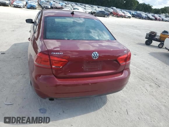 ✅ 2015 Volkswagen Passat Limited Edition • VIN: 1VWAT7A3XFC041107 • Lot: 62080525. Listed on Copart with 125,646 mi. Free auction sales archive from the USA and detailed vehicle history report at DreamBid. Image 6.