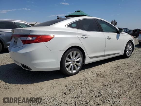 ✅ 2013 Hyundai Azera • VIN: KMHFH4JG3DA202817 • Лот: 70066305. Опубликован ранее на Copart с пробегом 147 437 миль. Бесплатный доступ к архиву аукционных продаж из США и подробный отчёт об истории автомобиля на DreamBid. Изображение 3.