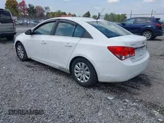 2011 Chevrolet Cruze LS z VIN 1G1PC5SH7B7158067, wystawiony jako IAAI lot #43251207 z przebiegiem 162 557 mil mil oraz . Historia ofert i sprzedaży dostępna na DreamBid. Obrazek 3.