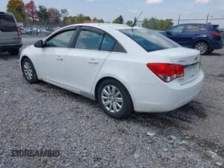 ✅ 2011 Chevrolet Cruze LS • VIN: 1G1PC5SH7B7158067 • Lot: 43251207. Listed on IAAI with 162,557 mi. Free auction sales archive from the USA and detailed vehicle history report at DreamBid. Image 3.