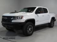 ✅ 2020 Chevrolet Colorado 4WD ZR2 • VIN: 1GCPTEE19L1134962 • Lot: 49314485. Listed on Copart with 143,005 mi. Free auction sales archive from the USA and detailed vehicle history report at DreamBid. Image 2.
