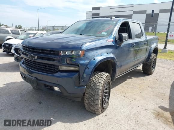 ✅ 2020 Chevrolet Silverado 1500 RST • VIN: 3GCUYEED0LG258618 • Lot: 43463681. Listed on IAAI with 137,129 mi. Free auction sales archive from the USA and detailed vehicle history report at DreamBid. Image 2.