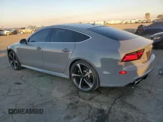 ✅ 2016 Audi RS 7 Prestige • VIN: WUAW2AFC5GN904924 • Лот: 83986724. Опубликован ранее на Copart с пробегом 43 748 миль. Бесплатный доступ к архиву аукционных продаж из США и подробный отчёт об истории автомобиля на DreamBid. Изображение 2.
