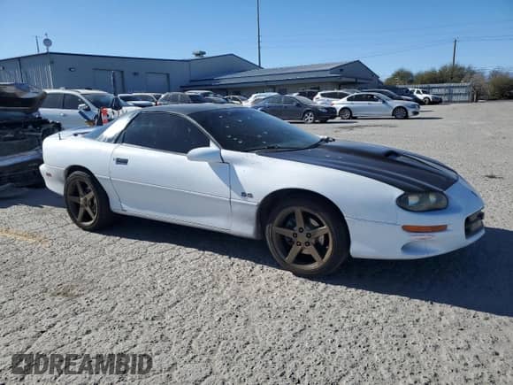 2002 Chevrolet Camaro Z28 z VIN 2G1FP22G922146192, wystawiony jako Copart lot #87924525 z przebiegiem 151 770 mil mil oraz Szkoda całkowita • Salvage title. Historia ofert i sprzedaży dostępna na DreamBid. Obrazek 4.