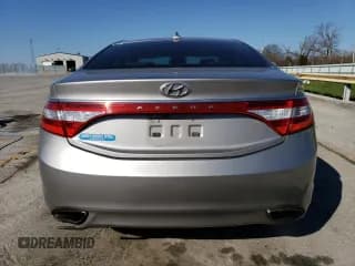 ✅ 2013 Hyundai Azera • VIN: KMHFG4JG8DA256908 • Лот: 50573915. Опубликован ранее на Copart с пробегом 146 015 миль. Бесплатный доступ к архиву аукционных продаж из США и подробный отчёт об истории автомобиля на DreamBid. Изображение 6.
