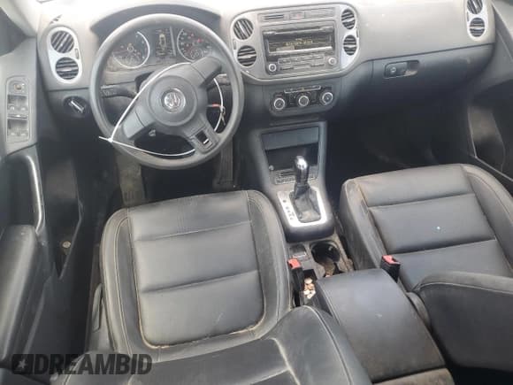 ✅ 2012 Volkswagen Tiguan LE • VIN: WVGAV7AX3CW577127 • Lot: 62021155. Listed on Copart with 103,605 mi. Free auction sales archive from the USA and detailed vehicle history report at DreamBid. Image 8.