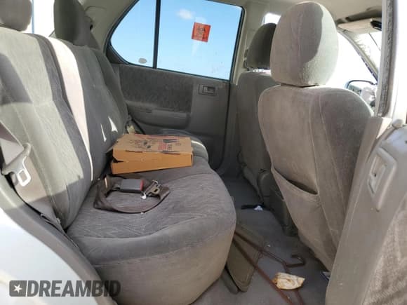 ✅ 2004 Isuzu Rodeo S • VIN: 4S2CK58Y244309017 • Lot: 83303294. Listed on Copart with 121,723 mi. Free auction sales archive from the USA and detailed vehicle history report at DreamBid. Image 11.