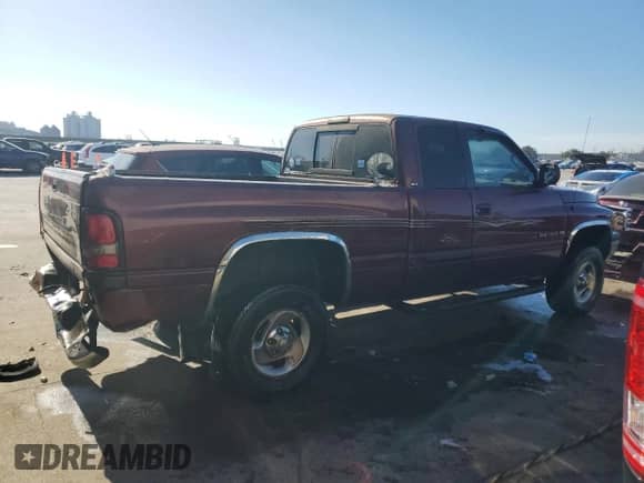 2001 Dodge 1500 z VIN 1B7HF13Z51J292550, wystawiony jako Copart lot #77139774 z przebiegiem 291 671 mil mil oraz Szkoda całkowita • Salvage title. Historia ofert i sprzedaży dostępna na DreamBid. Obrazek 3.