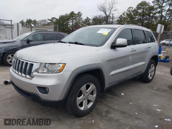 ✅ 2011 Jeep Grand Cherokee Laredo • VIN: 1J4RR4GG4BC671187 • Lot: 43777735. Listed on IAAI with 115,785 mi. Free auction sales archive from the USA and detailed vehicle history report at DreamBid. Image 17.
