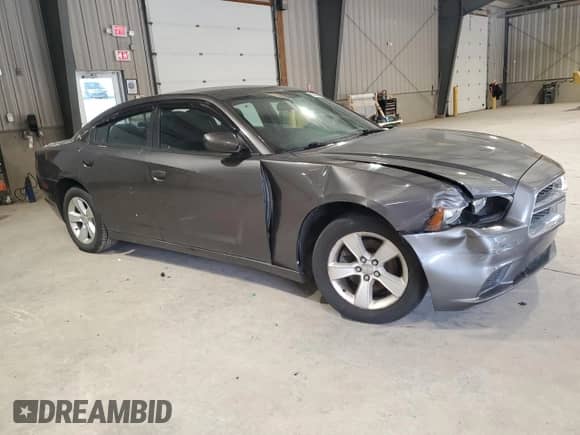 2014 Dodge Charger SE with VIN 2C3CDXBG7EH215483, listed as a Copart auction lot 90505305 with 133,419 mi miles and Clean title. Bid and sale history available at DreamBid. Image 4.