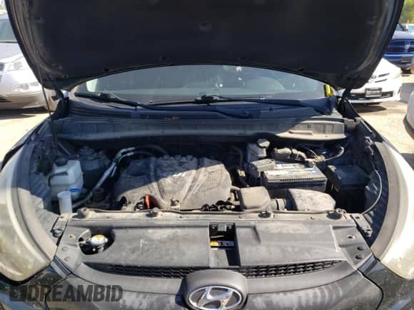 2015 Hyundai Tucson SE z VIN KM8JU3AG9FU098996, wystawiony jako Copart lot #58232184 z przebiegiem 73 430 mil mil oraz Szkoda całkowita • Salvage title. Historia ofert i sprzedaży dostępna na DreamBid. Obrazek 12.