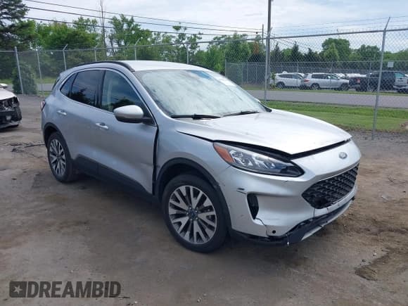 ✅ 2020 Ford Escape Titanium • VIN: 1FMCU9J99LUB45758 • Lot: 42286143. Listed on IAAI with 51,177 mi. Free auction sales archive from the USA and detailed vehicle history report at DreamBid. Image 1.