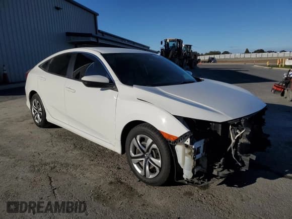 ✅ 2018 Honda Civic LX • VIN: 19XFC2F51JE202855 • Лот: 91293445. Опубликован ранее на Copart с пробегом 56 359 миль. Бесплатный доступ к архиву аукционных продаж из США и подробный отчёт об истории автомобиля на DreamBid. Изображение 4.