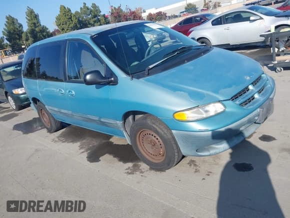 ✅ 1999 Dodge Caravan SE • VIN: 2B4GP45R3XR435259 • Lot: 43821383. Listed on IAAI with 112,156 mi. Free auction sales archive from the USA and detailed vehicle history report at DreamBid. Image 1.